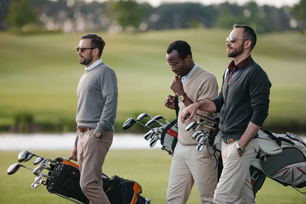 Men-playing-golf-with-watches-on