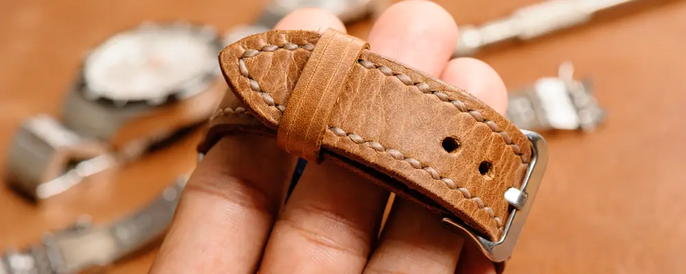 closeup handmade brown leather watch strap, leather product