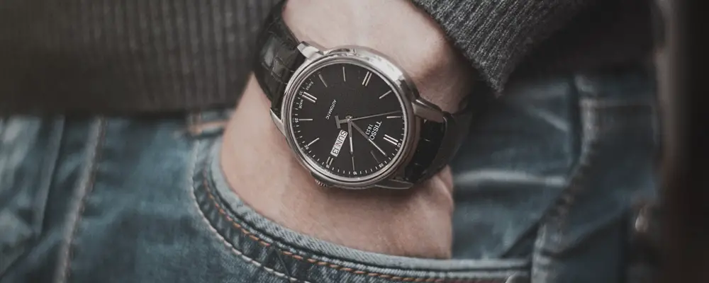 Swiss wrist watch on a mans hand