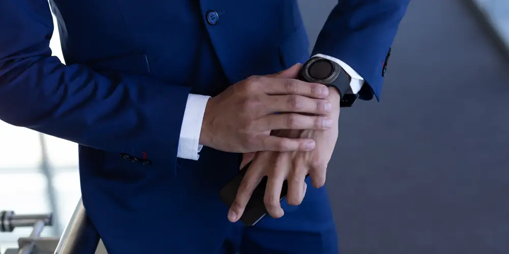 Businessman using smartwatch